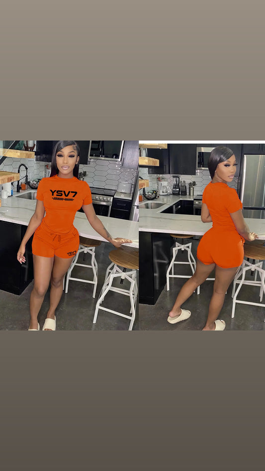 WOMENS FITTED ORANGE SHORT SET BLACK LOGO