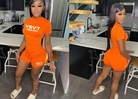 WOMENS FITTED ORANGE SHORT SET WHITE LOGO